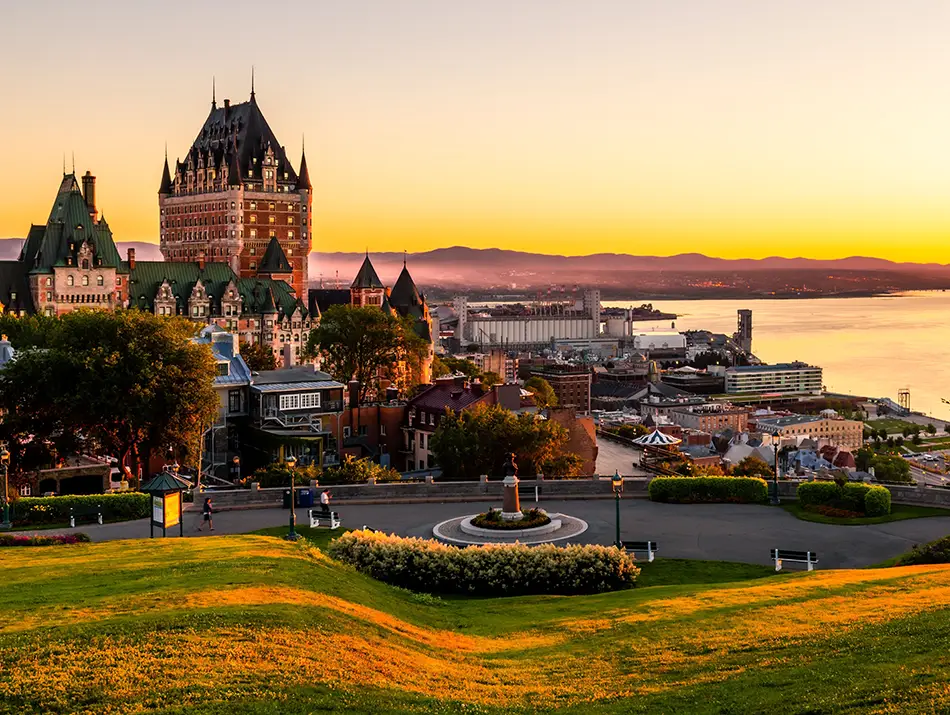 Sunset over Québec City’s old town highlights why it’s among the best sustainable travel destinations.