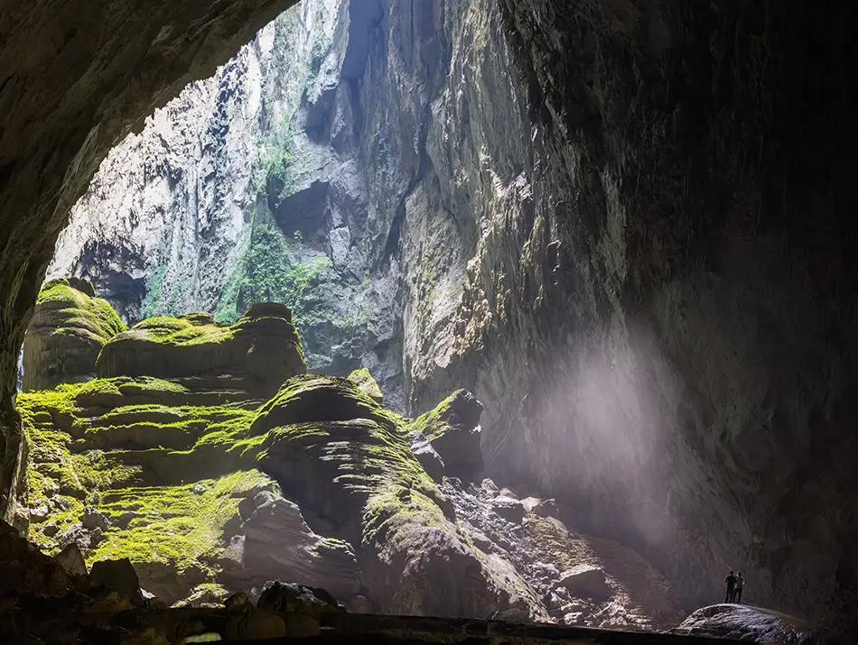 Sunlight pours into Son Doong’s entrance, a highlight often listed among the Best Things to Do in Phong Nha.
