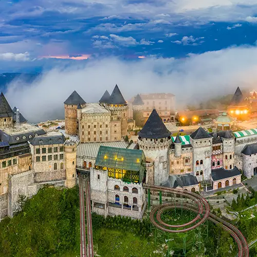 The French-style village at Ba Na Hills covered in drifting mountain fog, a Da Nang top attraction.