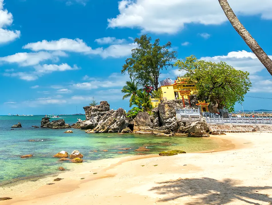 A small rock temple by the ocean