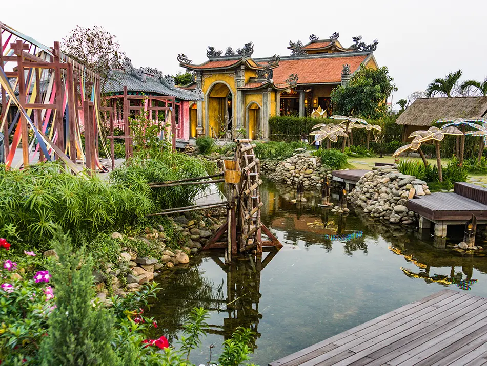 A landscaped riverside park presents one of the best things to do in Hoi An with cultural shows and sets.