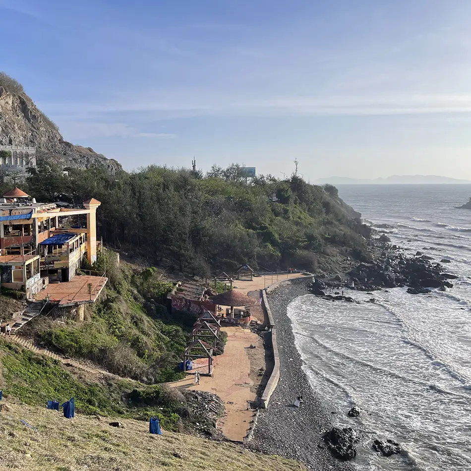 Rugged cliffs and blue waters along the dramatic coastline of the cape.