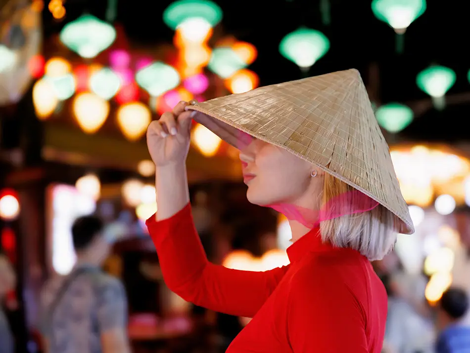 Vibrant lantern lights and crowds capture the lively Da Nang nightlife after dark.