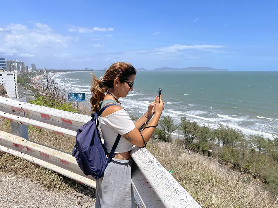 Visitor enjoying the ocean panorama from Piggie Hill, a best thing to do in Vung Tau.