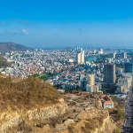 Drone view of Vung Tau showing its coastline, mountains, and major landmarks featured among the best things to see in Vung Tau