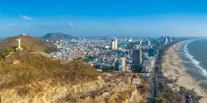 Drone view of Vung Tau showing its coastline, mountains, and major landmarks featured among the best things to see in Vung Tau