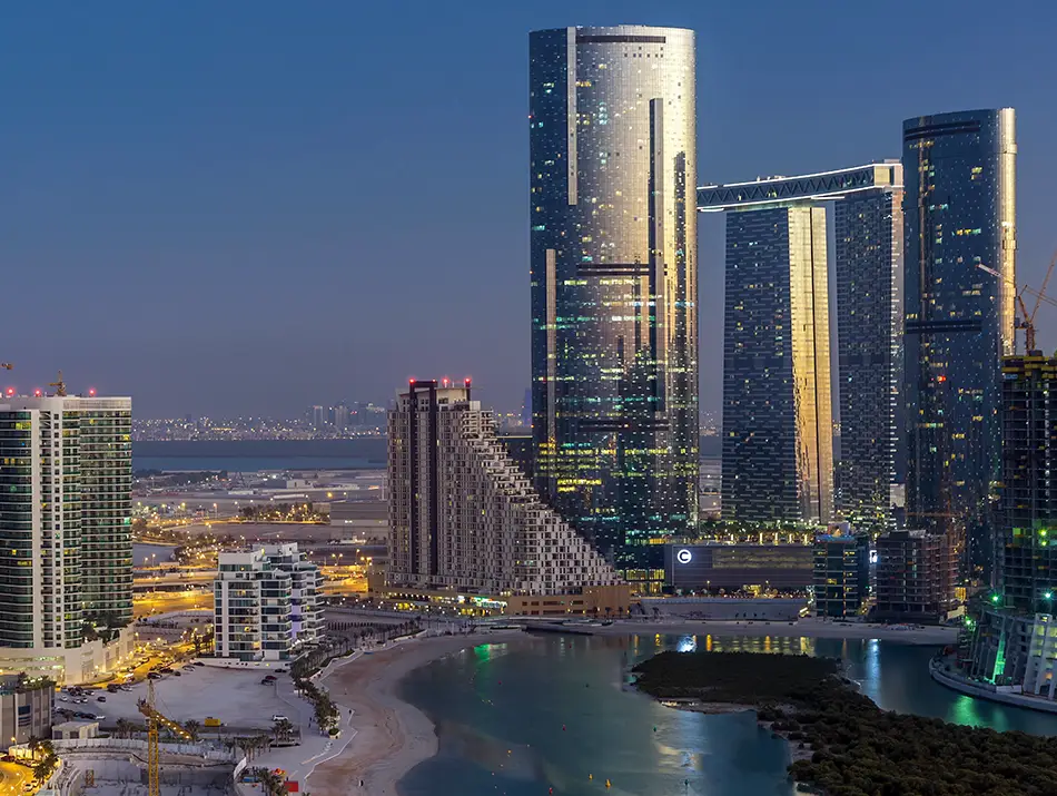 Abu Dhabi waterfront district with high-rises and canals, part of new fashion shopping destinations in 2026