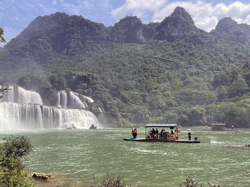 Ban Gioc Waterfall cascades in multiple tiers, representing iconic natural attractions in Vietnam.