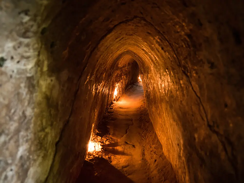 Exploring underground tunnels is a Must-do in Ho Chi Minh for history lovers.
