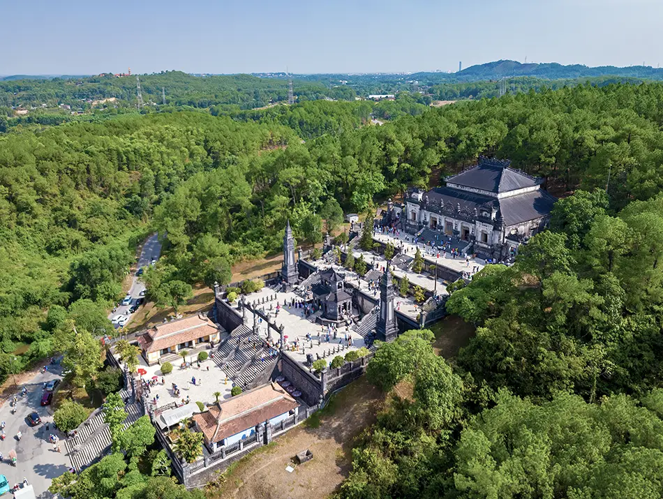 Grand hillside mausoleum with steep stairways, one of the striking attractions in Hue.