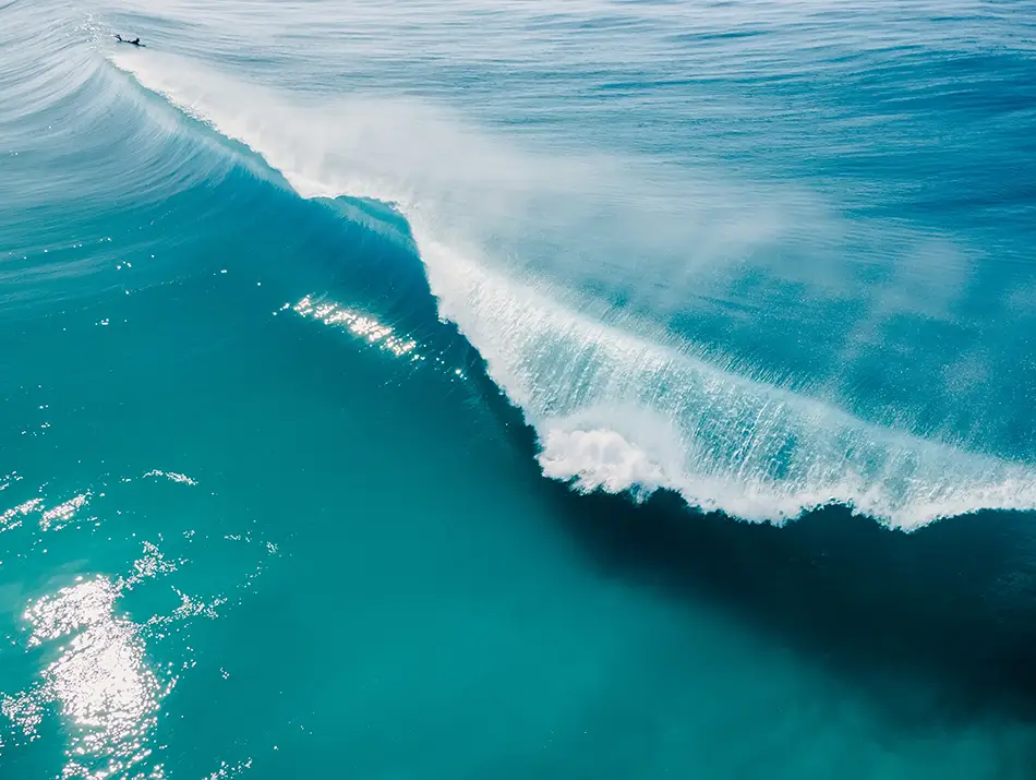 Aerial view of an Atlantic barrel near Praia de Mira, Portugal, breaking clean.
