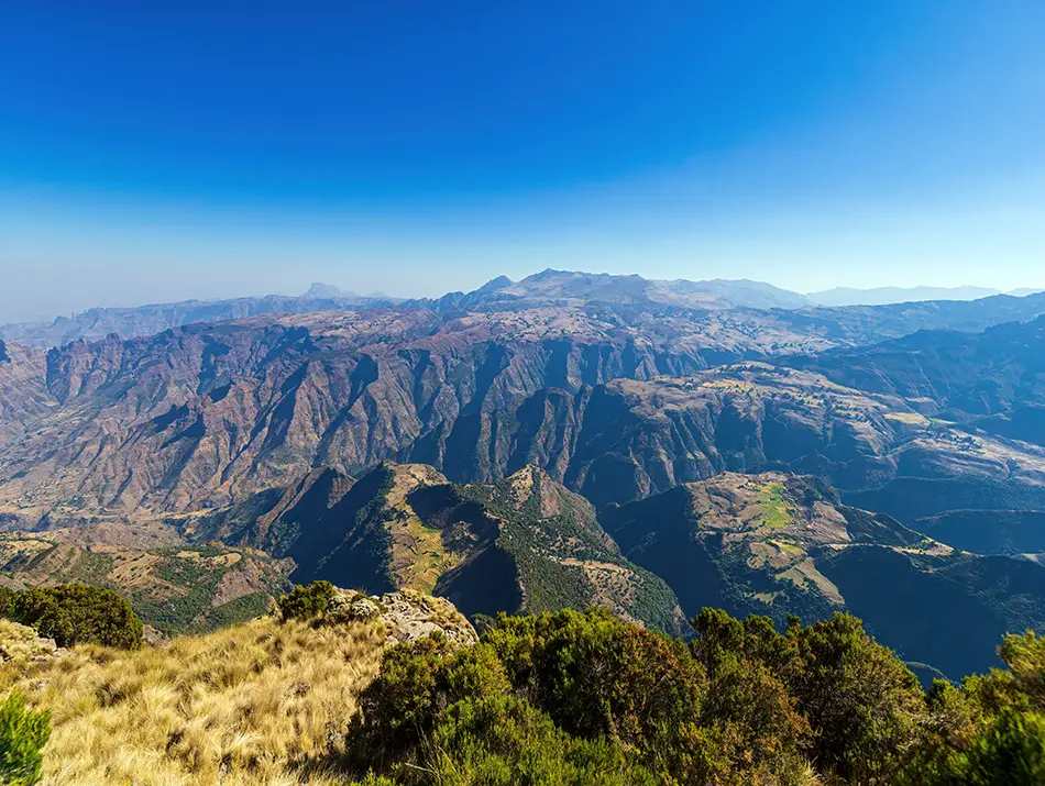Simien Mountains escarpment, underrated hiking destinations with highland trekking views.