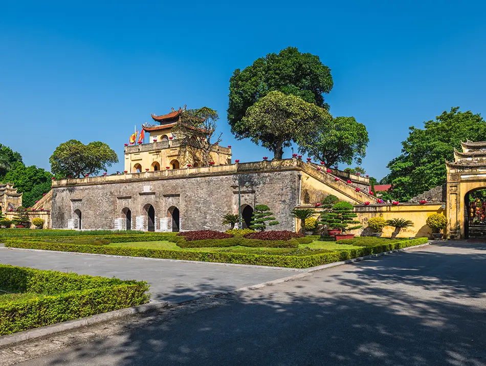 Historic gate and flag tower form part of Thang Long Citadel, key Vietnam tourist attraction in Hanoi.