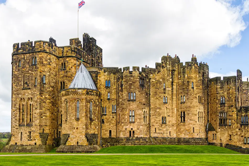 Alnwick Castle courtyard and towers used as Hogwarts in Harry Potter films.
