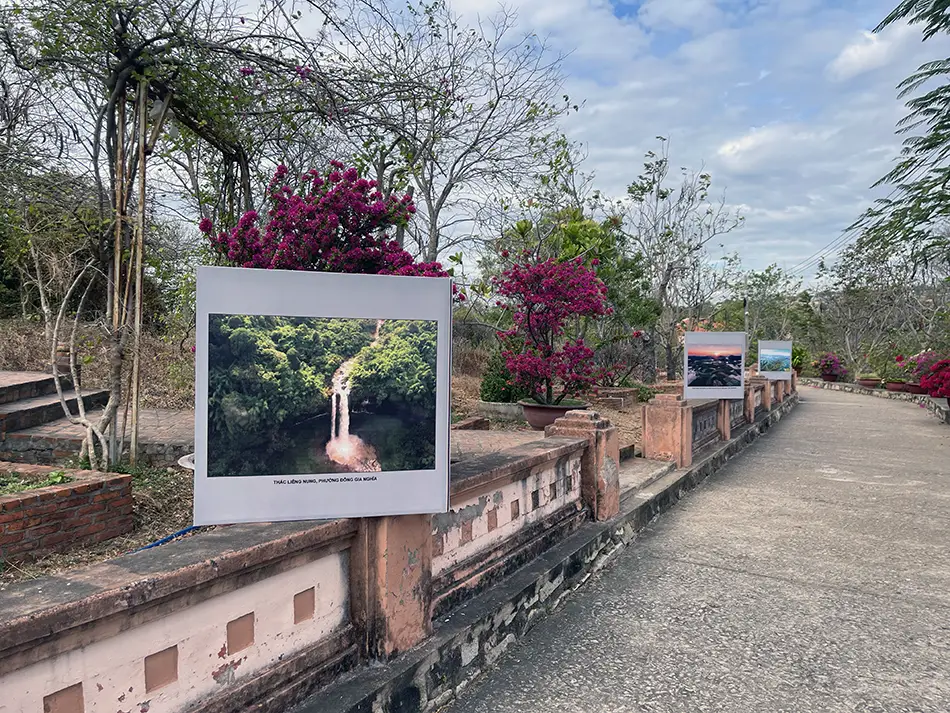 Photo panels along the path to Cham towers near Mui Ne.
