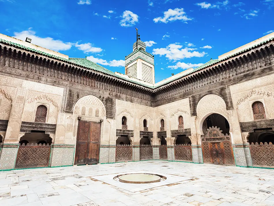 Bou Inania Madrasa courtyard with fountain, a highlight of Best Things to Do in Fes.
