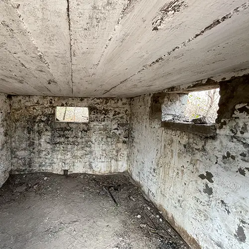 Concrete bunker room with firing slits, War History attraction in Mui ne.