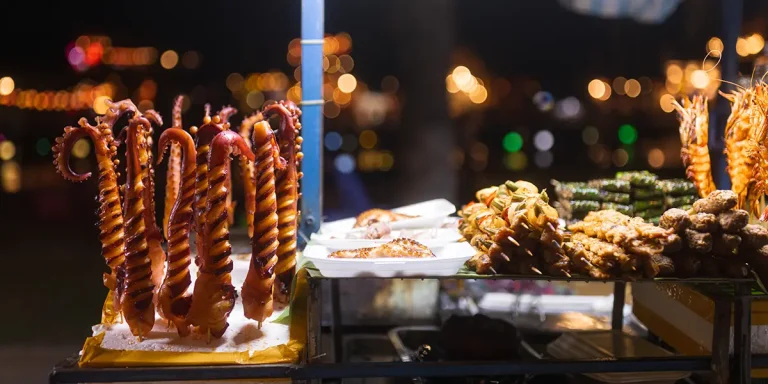 Seafood skewers and grill setup, typical of best food in Mui Ne after dark.