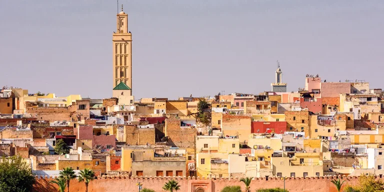 Panoramic skyline and minaret above Meknes medina, highlighting the best things to do in Meknes.