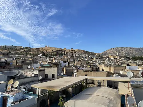 Rooftop terrace overlooking the medina, one of the unique sights in Fes.