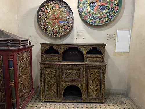 Traditional woodwork tools and artifacts displayed inside the museum galleries of Fes.