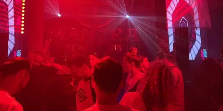 Party crowd moving to music inside the Mantra Club - a central Mui Ne Nightlife hotspot.