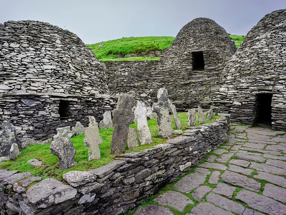 Stone beehive huts and steps on Skellig Michael linked.