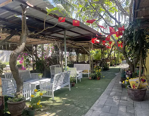 Shaded courtyard seating at Yo Yo, among top vegetarian restaurants in Mui Ne.