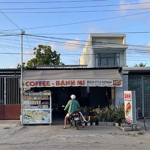 Simple Mui Ne roadside cafe with a shaded terrace.