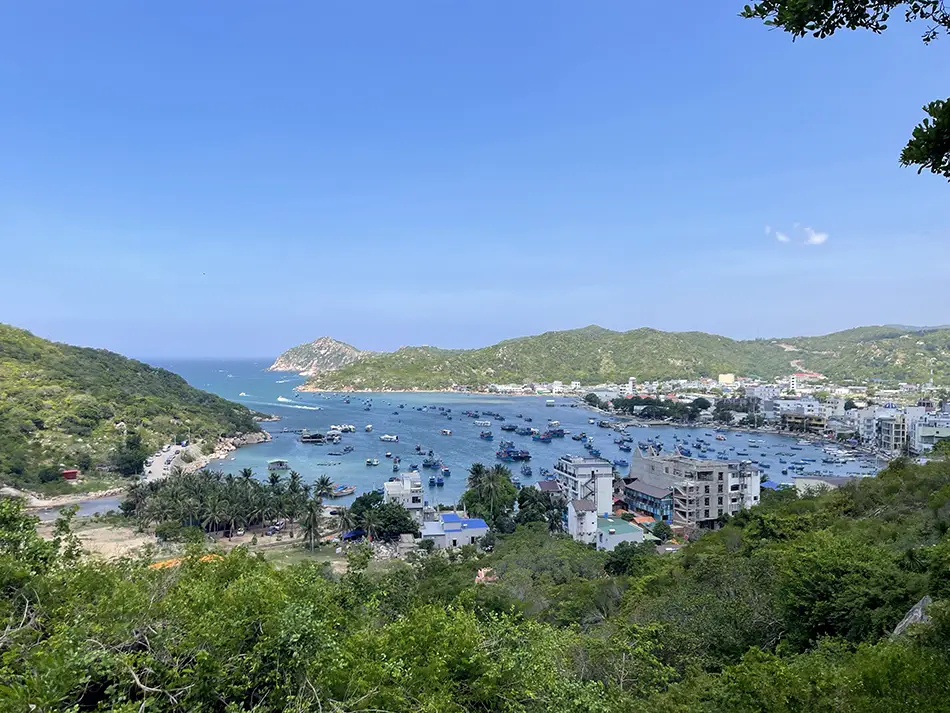 Elevated view from the road looking down over Vinh Hy and its surrounding bay.
