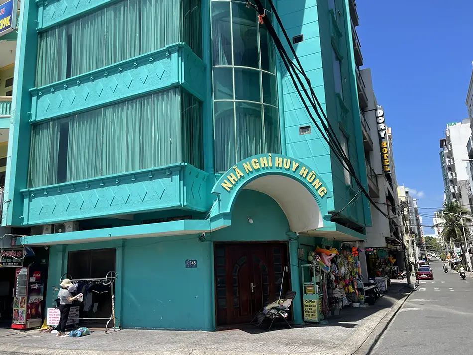 Turquoise building on a quiet Vung Tau street.
