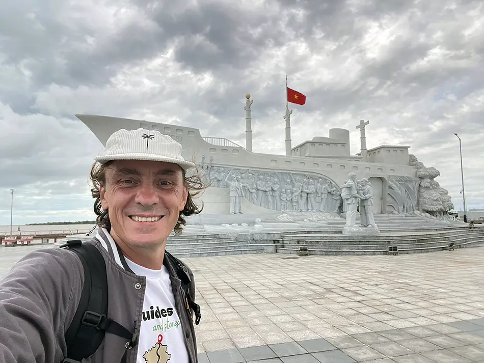 Traveler in front of an off the beaten path attraction in Vietnam called "Ship to the North"
