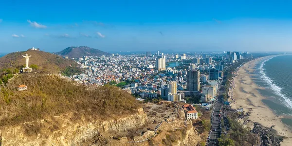 Drone view of Vung Tau showing its coastline, mountains, and major landmarks featured among the best things to see in Vung Tau